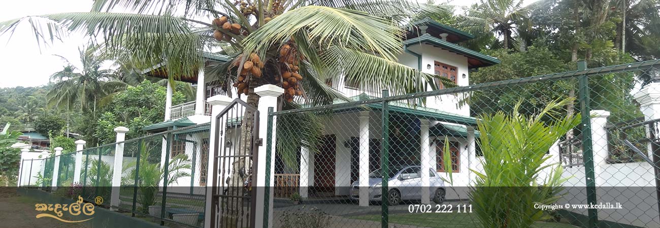 House building contractors in Kandy Sri Lanka done fully completed two storey house and green fence